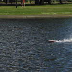 Clapham Common in London fast toy motor boat